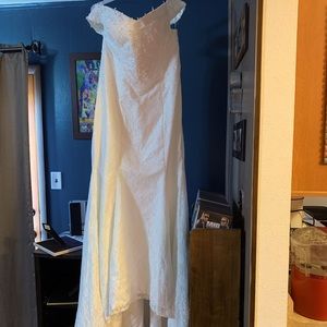 Brand new never worn or altered ivory lace wedding dress